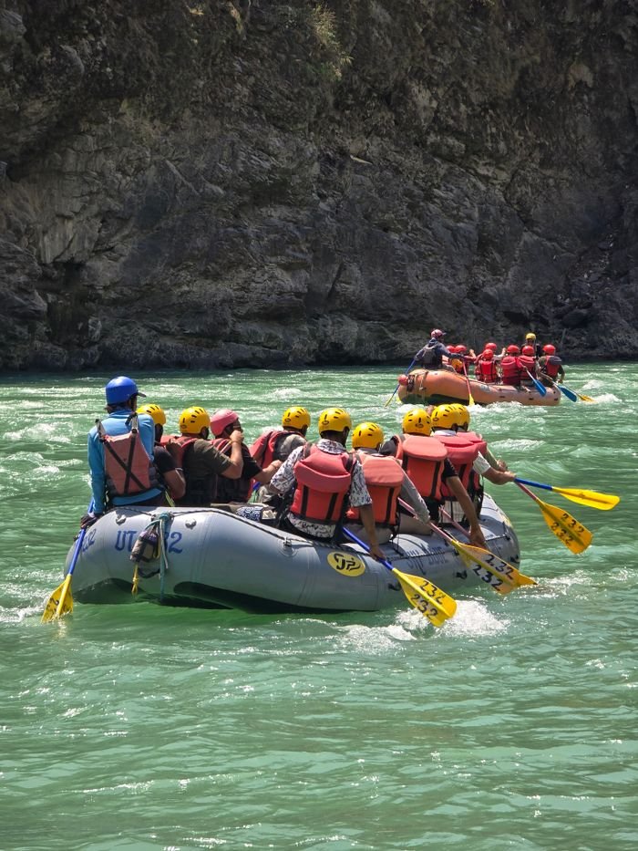 Thrilling white water rafting experience on the Ganges River in Rishikesh, India. Perfect for adventure enthusiasts.